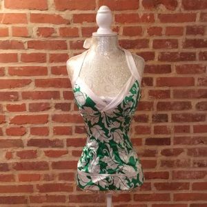 Bebe Reversible floral pattern satin halter top.